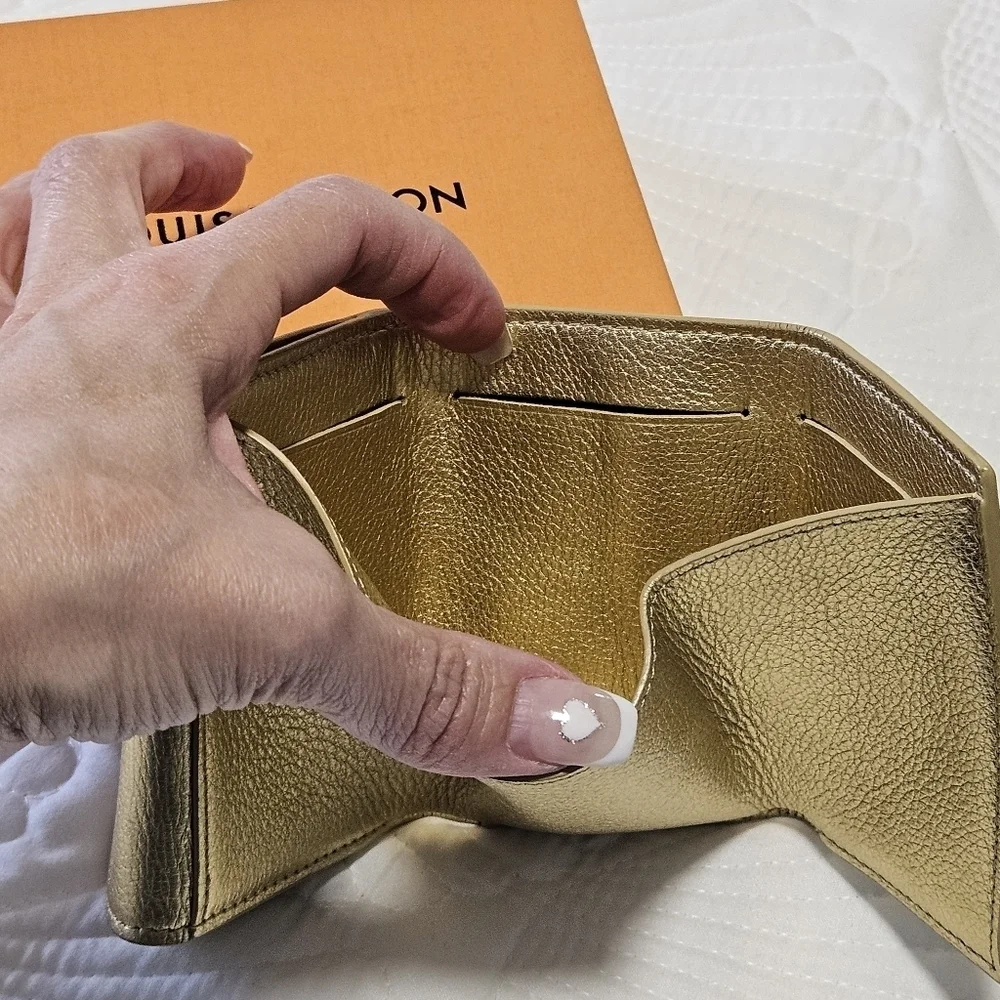 LOUIS VUITTON Portefeuille lock mini Compact Wallet Trifold Leather